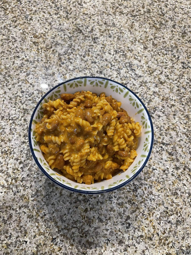 [a photograph of a bowl of mac and chili]